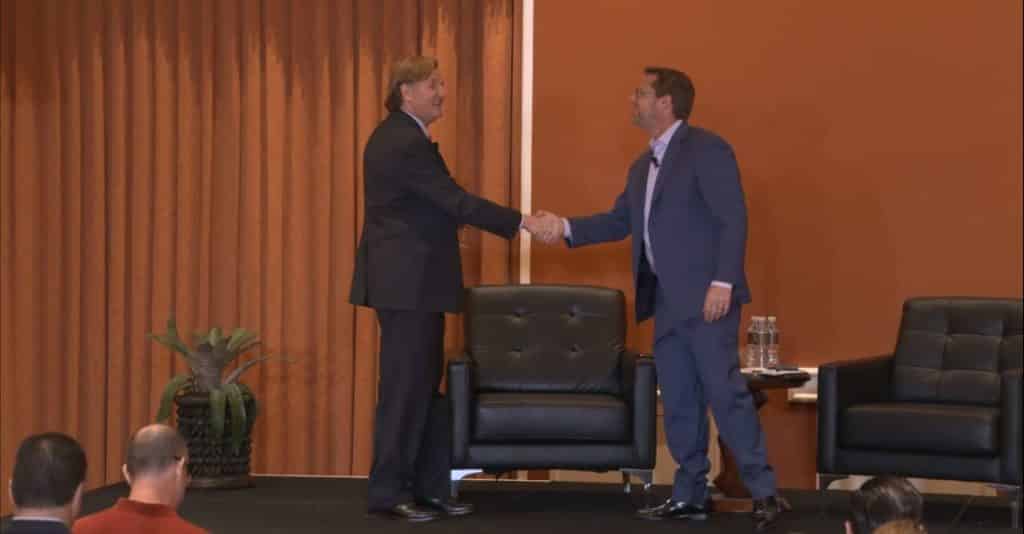 Photo of Steve Nober shaking hands with a legal industry professional